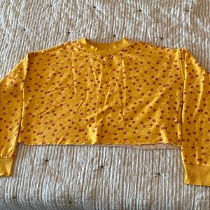 Size medium, cropped yellow with red flowers sweatshirt.